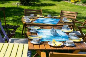 Outdoor tables set up for garden meal