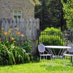 yard with nice table and chairs next to flower garden Home Garden Design Ideas For New Gardens❀Fairy Circle Garden