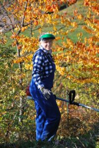 Woman holding weedeater