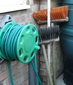 do i prepare my garden winter hose stored