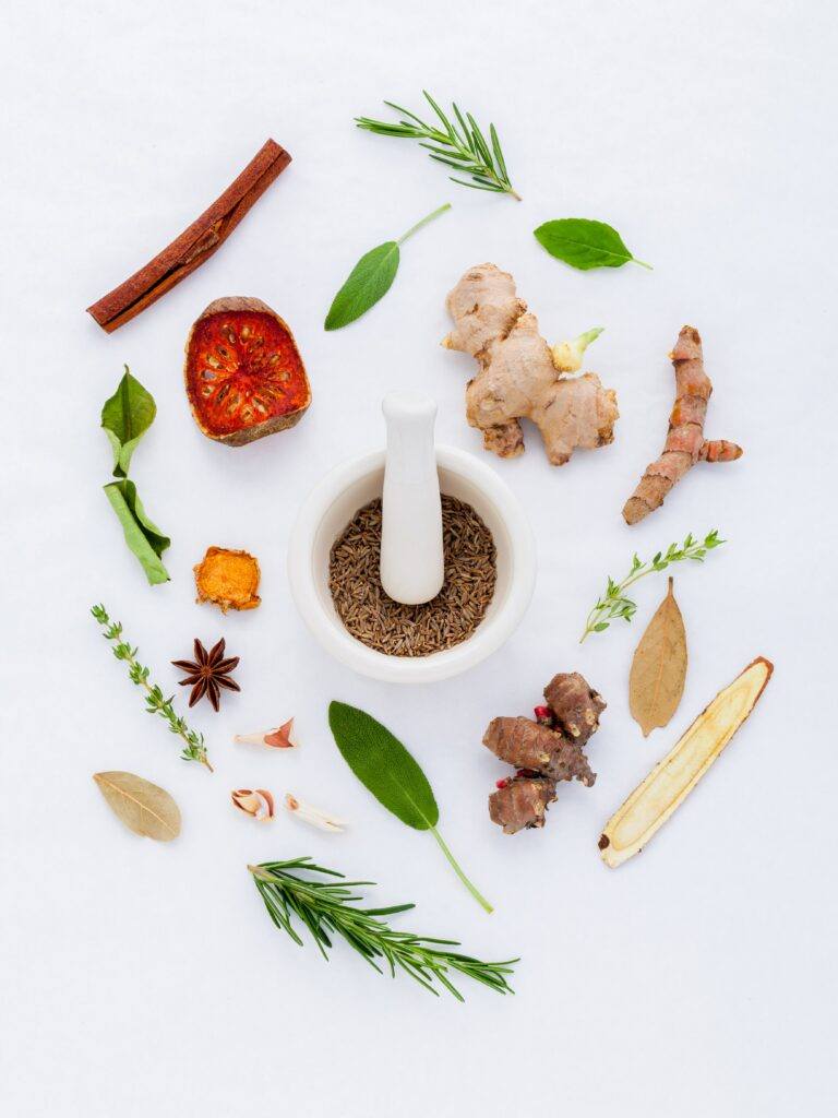 Herbs surrounding mortar and pestle Photo by Pixabay Organic Garden Seeds For Sale Online